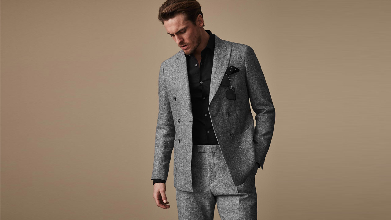 The art of wearing a black button up shirt.